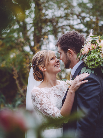 Bride and groom kissing